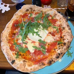 Forza Pizza Bar in West Kirby, featuring Forza Burrata and Margarita pizzas, known for large portions and Italian flavors.