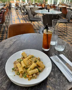 Rigatoni and lemon soufflé at Gee's restaurant in Oxford's air-conditioned conservatory, with vintage menus and friendly staff.