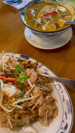 Thai dishes at Botree Kitchen, Belfast; vibrant flavors, BYOB with corkage fee, popular spot with reservations recommended.
