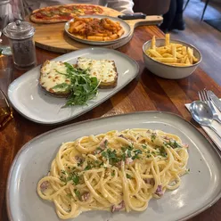 Family-run Italian restaurant Pepe Nero in Stockbridge, Edinburgh, known for generous portions and perfect Italian dishes.