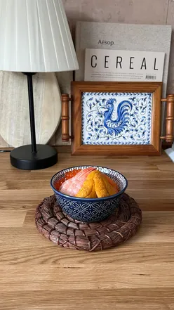 Sea urchin, salmon roe, salmon belly, and ebi prawn sashimi bowl with chopsticks, gifted by Celeplate.