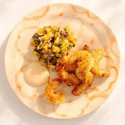 Crispy coconut prawns with pineapple salsa, chili, mint, and tabasco mayo, styled by Bethany Ferguson, photographed by Clair Irwin.