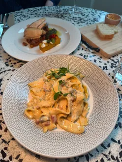 New menu at Hazel Restaurant in Glasgow featuring Orkney lobster mac spring roll, Ayrshire lamb croquettes, pappardelle with crispy jamon, and Devil’s Margarita cocktail.
