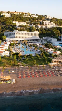 Luxury hotel in Rhodes, Greece with beach bungalows, pool views, fine dining, beach club, gelato, and free kids stay.