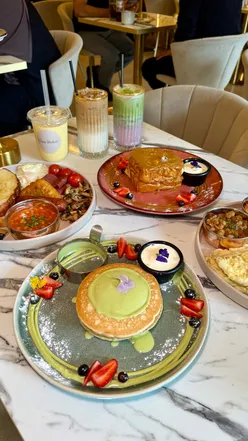 Chaa Biskut Birmingham brunch with Full English, Desi breakfast, pancake stacks, French toast, iced matcha, and milk badaam.