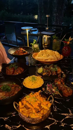 Bengali-owned 70one restaurant in Northampton offers dishes like Goan salmon curry, chicken lollipop, and sticky toffee pudding.