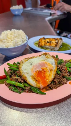 Dishes from Singburi 2.0 Thai restaurant in Shoreditch, London, featuring a full menu except cabbage and dry dill pork sausage.