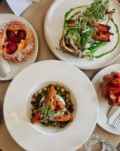 Courgette fritters and pistachio strawberry croissant tart at dog-friendly The Early Bird Bakery, Kings Heath brunch spot.