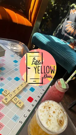 Cozy Notting Hill bar, The Little Yellow Door, with signature cocktails and vibrant atmosphere, located at 6โ8 All Saints Road, London.