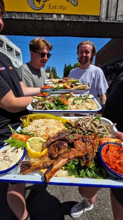 Authentic Turkish grill at Baltic Market with chargrilled kebabs, juicy chicken wings, halloumi, falafel, and spicy sausage.