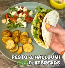Summery pesto halloumi flatbread with rocket from M&S, 550 calories, 28g protein, featuring chicken for Ryan's version.