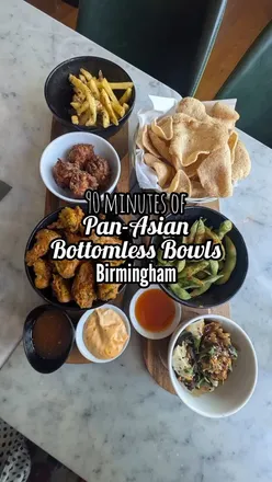 Pan-Asian Bottomless Bowls at Banana Tree Birmingham, featuring prawn crackers, steamed chicken dumplings, and mocktails.