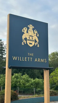 Dining at The Willet Arms in Wimborne, Dorset: Pan-fried king prawns, chicken skewers, rib-eye steak, steak pie, lemon tart, and chocolate cookie with ice cream.