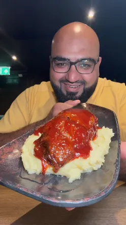 Mouthwatering boneless BBQ rib, rated 9/10, priced at ยฃ133, in Bradford. Perfect for BBQ lovers and food enthusiasts.