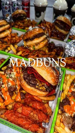 Food lovers enjoying gourmet burgers at Cardiff's new burger spot. #CardiffFood #HalalFood