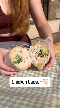 Outdoor dining at SUB126 in Glasgow, featuring chicken Caesar salad sub and meatball Mareneria.