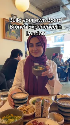 Brunch at Willows Clapham Common featuring scrambled eggs, banana bread, and a light hot chocolate.