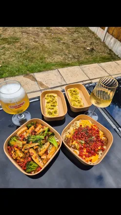 Delicious pasta tossed in a giant cheese wheel with toppings at Cheese and Pasta Co in Nottingham.