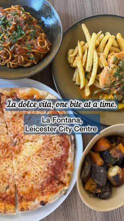 Dining at La Fontana in Leicester, featuring authentic Italian dishes like Spaghetti Ragú and Margherita pizza.