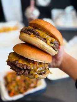 Delicious spread of burgers, fries, and shakes at Get A Burger's 1st birthday celebration in Glasgow.