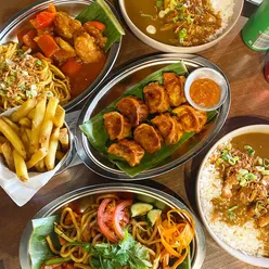 Enjoying udon noodles and dumplings during a catch-up at Gaijin in Levenshulme, Manchester. Halal dining experience!