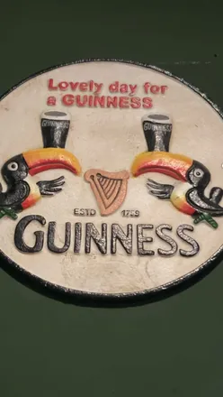 Customers enjoying drinks and live music at Katie O’Brien’s, a lively Irish bar in Birmingham's city center.