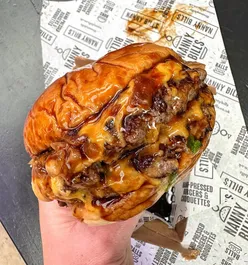 Delicious burgers and fries at Nanny Bill's, showcasing burger heaven and foodie excitement!