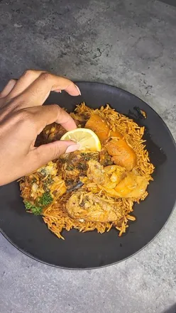 Delicious Senegalese dishes including Thieboudienne, Maafe, and refreshing drinks at Senegal Kitchen in Manchester.