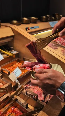 Unlimited Chinese hotpot and Korean BBQ ingredients at Daiu on Black Lion Street, perfect for solo diners and couples.