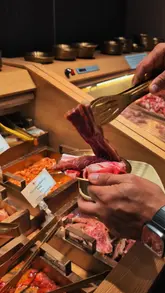 Unlimited Chinese hotpot and Korean BBQ ingredients at Daiu on Black Lion Street, perfect for solo diners and couples.