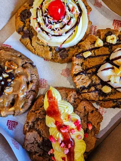 Gluten-free, vegan cookies from The After School Cookie Club featuring strawberry lemonade, birthday cake, peanut butter, and s'mores.