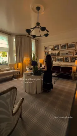 Cozy boutique hotel cafe in London’s Queen’s Gate, showcasing elegant decor and inviting atmosphere for coffee lovers.