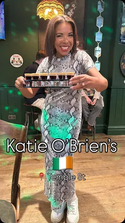 Lively atmosphere at Katie O'Brien's Irish tavern in Birmingham with live music, dancing, and drinks flowing.