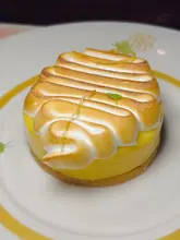 Lemon meringue tart with burnt meringue on shortbread at Bob Bob Ricard, London, perfect for a girls dinner.