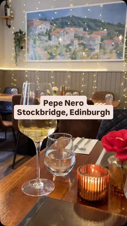 Half and half pasta dish at Pepe Nero in Stockbridge, Edinburgh, featuring delicious Italian cuisine and a cozy atmosphere.