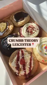 Delicious array of gourmet cookies from Crumb Theory, featuring unique flavors like Cake Batter and Raspberry Cheesecake.