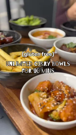 Unlimited bowls of gluten-free curry and snacks at Banana Tree, Bath, featuring beef rendang, tofu green curry, and more.