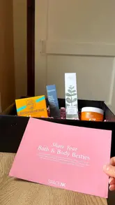 Delivery from Space NK featuring Soled Janeiro cream, This Works products, Caribbean body scrub, and Olverum body oil.