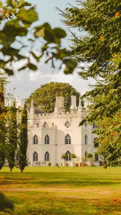 Strawberry Hill House, a gothic revival gem in Twickenham, London, surrounded by beautiful gardens and inviting café.