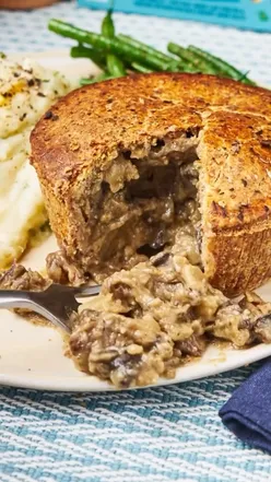 Stop motion of fresh ingredients transforming into a delicious Mushroom Pie by Clive's Purely Plants.