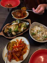 Delicious vegan feast at Castle Chinese in Lewes featuring skewers, gyoza, spring rolls, and more!