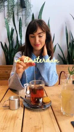 Vegan-friendly dining in Amsterdam showcasing diverse plant-based dishes at top eateries. Enjoying vibrant food culture! 🍜🥟✨