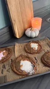 Delicious s'mores cookies fresh from the oven, featuring chocolate, marshmallows, and digestive biscuits.