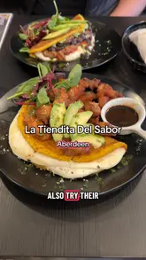 Delicious cachapas with pulled beef and crispy pork at La Tiendita El Sabor in Aberdeen, served with homemade hot sauce.