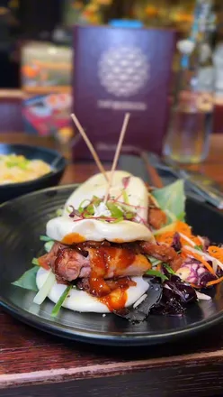 Lunch deals at The Muddler in Newcastle: Bento boxes, bao buns, and grilled chicken skewers for a delicious midday meal.