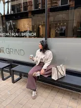 Fashionable autumn outfit featuring a Zara jacket and Adidas trainers, perfect for cozy September vibes in Leeds.