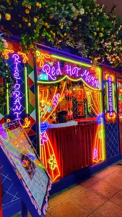 Customers enjoying meals at Red Hot Mamma Pizzeria, a trendy spot in Solihull and surrounding areas.