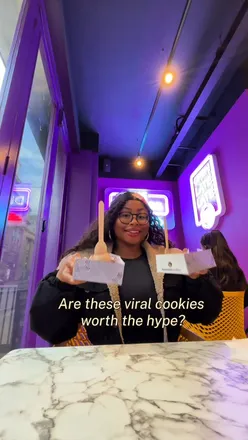 Indulging in delicious Insomniac Cookies’ Cookie’wich and brookie in Birmingham City Centre.