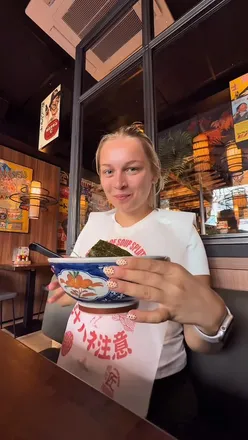 'Delicious bowl of ramen with vibrant toppings at Takumi Ramen in the Netherlands'