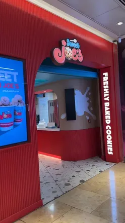 Delicious assortment of cookies including jammie dodger and chocolate fudge cake from Sweet Joes, Birmingham.